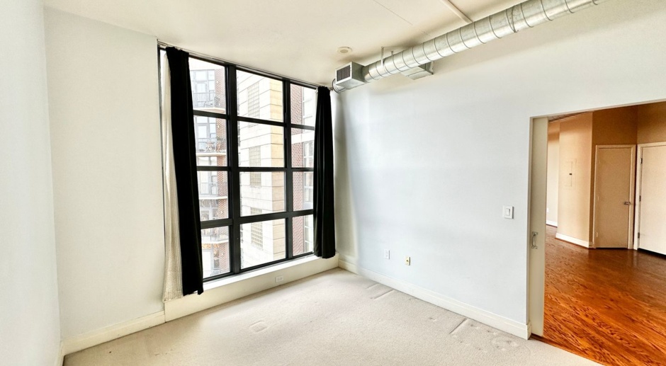 Spacious 2-bedroom 2 bath loft style apartment w/Parking and Balcony.