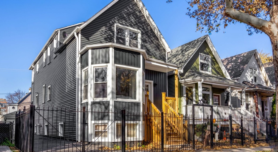 Spacious and Stunning Logan Square Duplex with 5 Bedrooms Plus