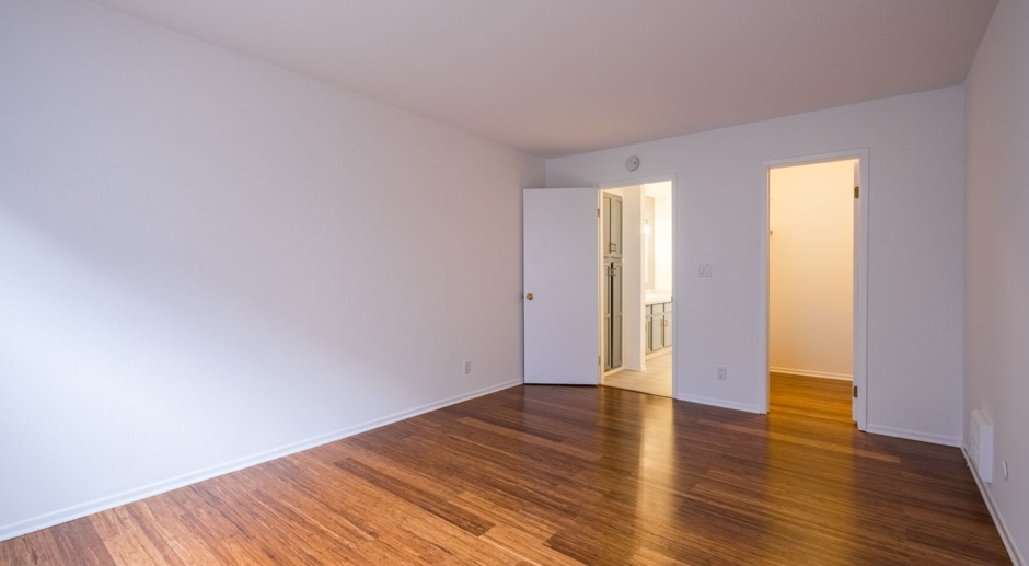Modern 1 Bedroom Condo w/Secure Parking + EV Charger, Balcony, Laundry + MORE! 