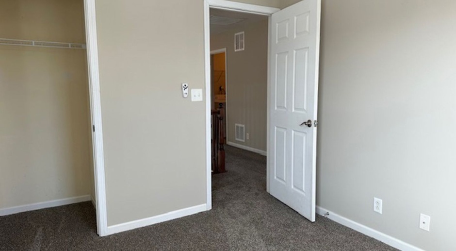 END UNIT TOWNHOME WITH 3 BEDROOMS, 2.1 BATHS, AND ATTACHED 2 CAR GARAGE!