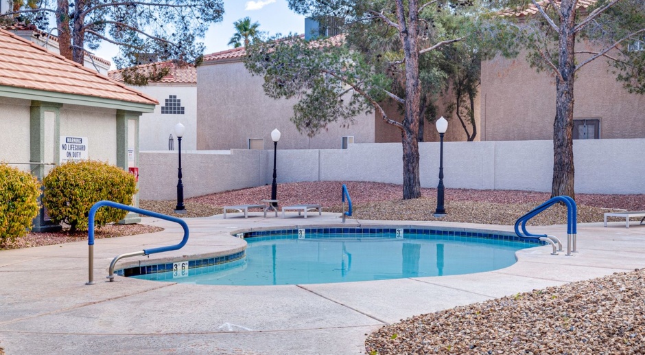 Two story home in gated neighborhood with 2 community pools.  Three bedrooms, 2.5 bathrooms, 2 car garage. 