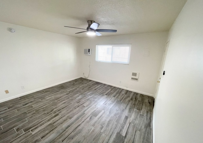 Apartments Near Utilities included! Nicely updated studio with Kitchenette, AC and Heat!