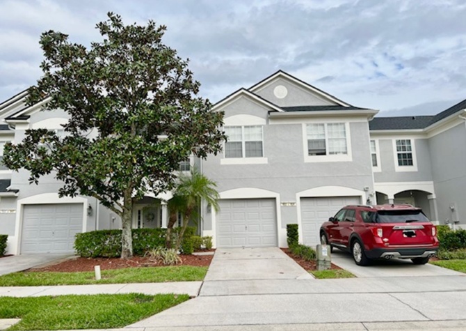 Houses Near MOVE IN NOW! Beautiful 3 bed 2.5 bath townhome with large screened in back porch & 1 car attached garage!! In man gated Spring Isle/Avalon Park!!