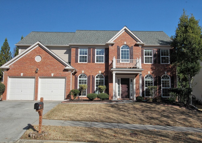 Houses Near IMMACULATE 4 BR/2.5 BA Brick Traditional in Suwanee! 