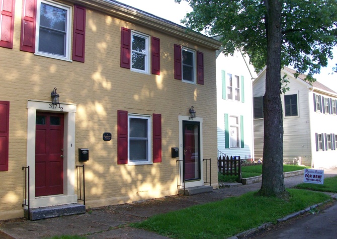 Houses Near Well-Maintained Historic Apartment Building